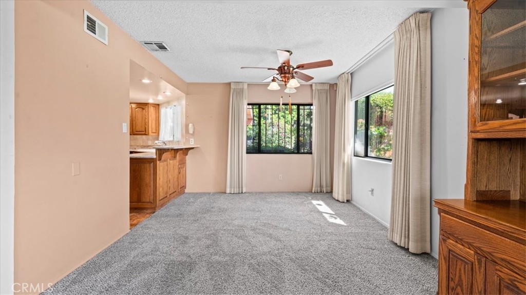 27196 10th Street Highland, CA 92346 - Photo 8 of 42 wooden floor in an empty room with a window