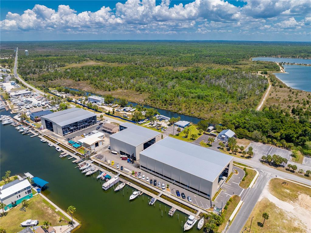 3379 Crape Myrtle Drive Hernando Beach, FL 34607 - Photo 18 of 68 an aerial view of a residential houses with outdoor space