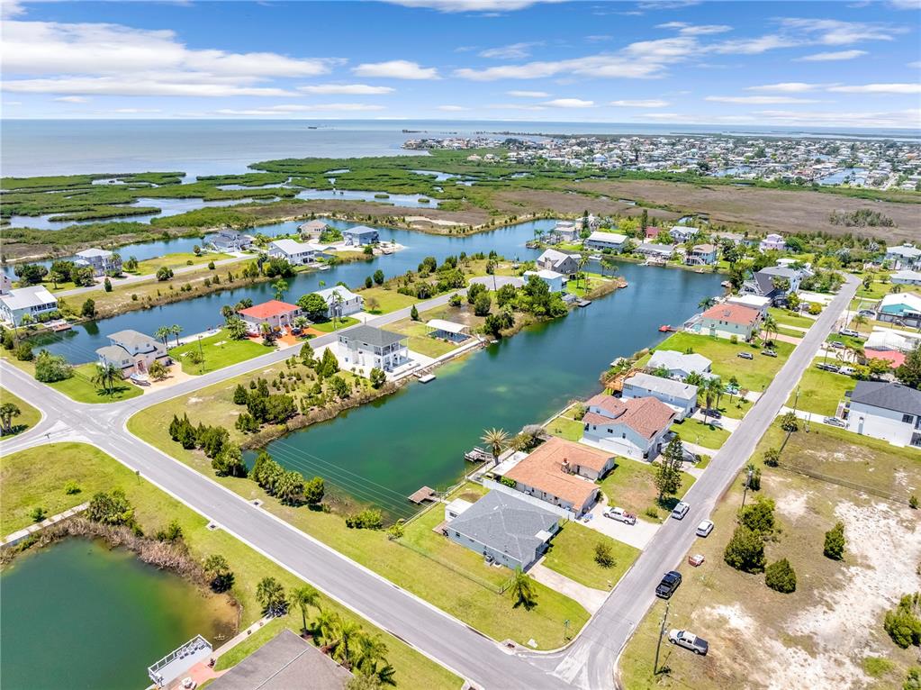 3379 Crape Myrtle Drive Hernando Beach, FL 34607 - Photo 3 of 68 a view of a city with an ocean