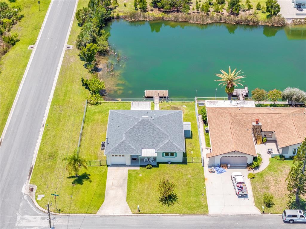 3379 Crape Myrtle Drive Hernando Beach, FL 34607 - Photo 4 of 68 an aerial view of a house with a swimming pool
