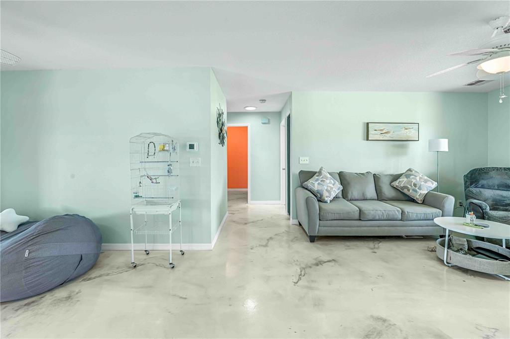 3379 Crape Myrtle Drive Hernando Beach, FL 34607 - Photo 44 of 68 a living room with furniture