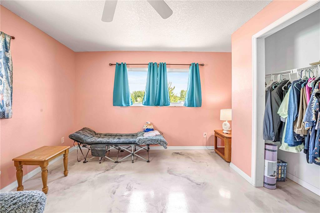 3379 Crape Myrtle Drive Hernando Beach, FL 34607 - Photo 51 of 68 a room with furniture and a closet