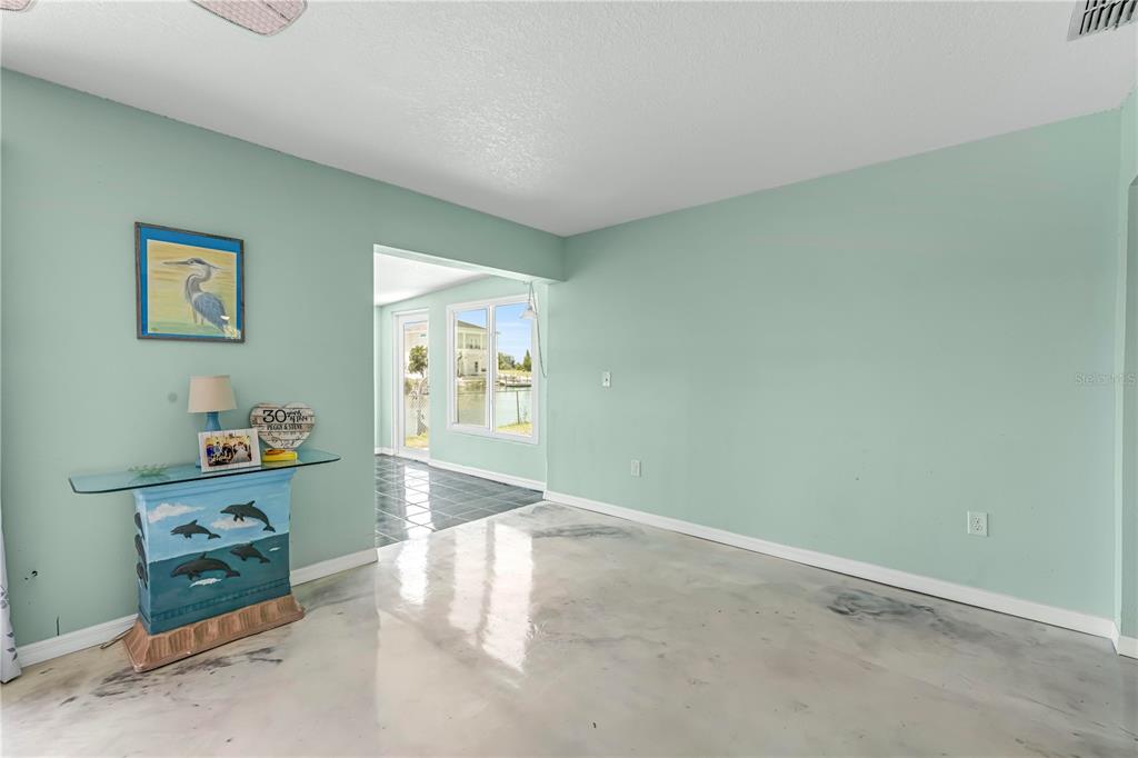 3379 Crape Myrtle Drive Hernando Beach, FL 34607 - Photo 7 of 68 a view of livingroom with toys