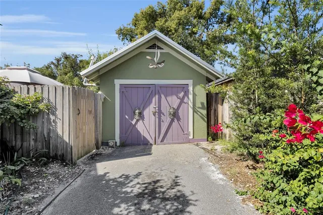 a front view of house with garage