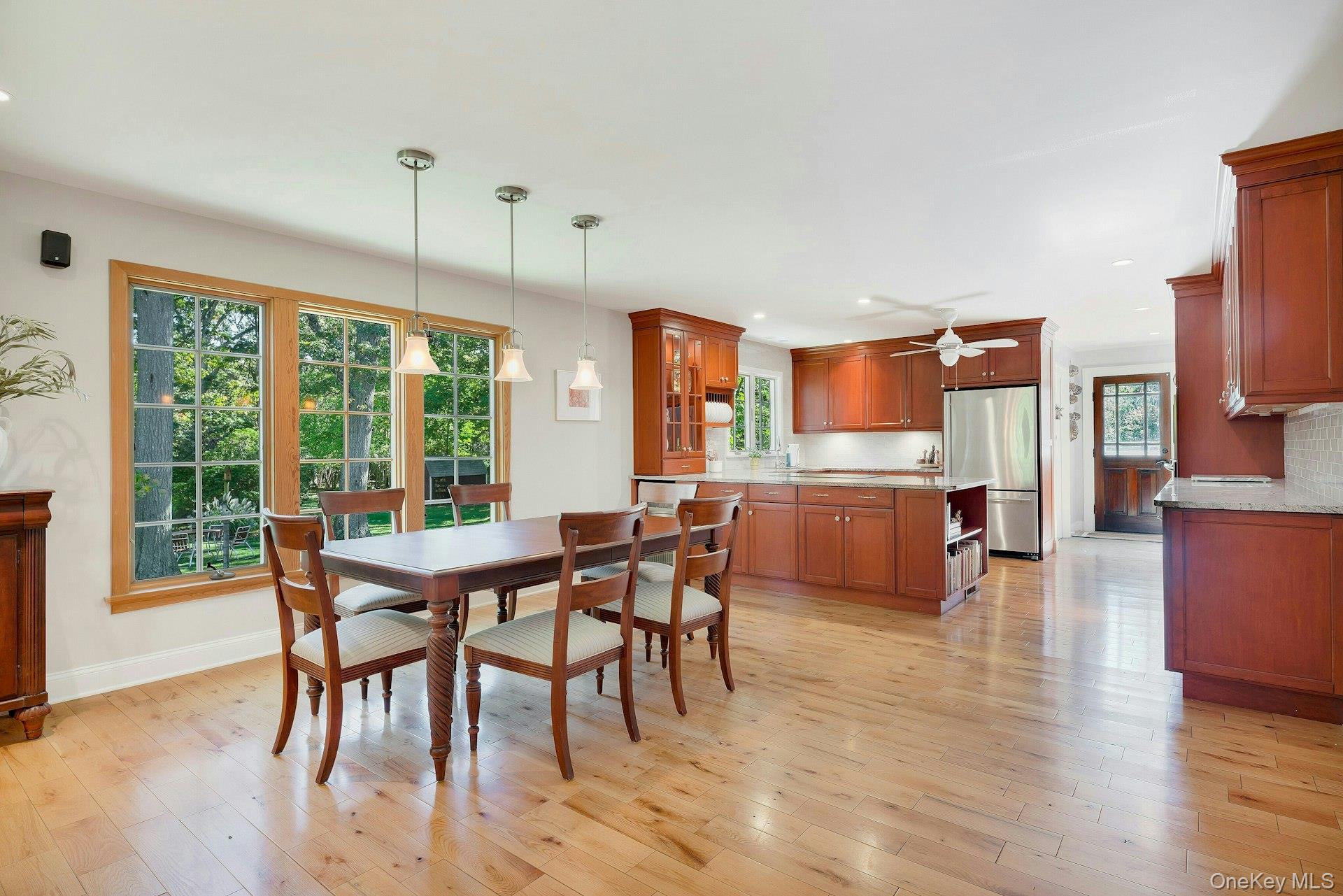 3600 Rocky Point Road East Marion, NY 11939 - Photo 11 of 45 a view of a dining room with furniture window and wooden floor