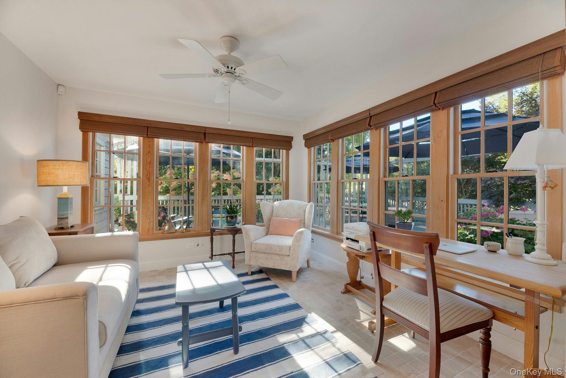 3600 Rocky Point Road East Marion, NY 11939 - Photo 15 of 44 a living room with furniture and a large window