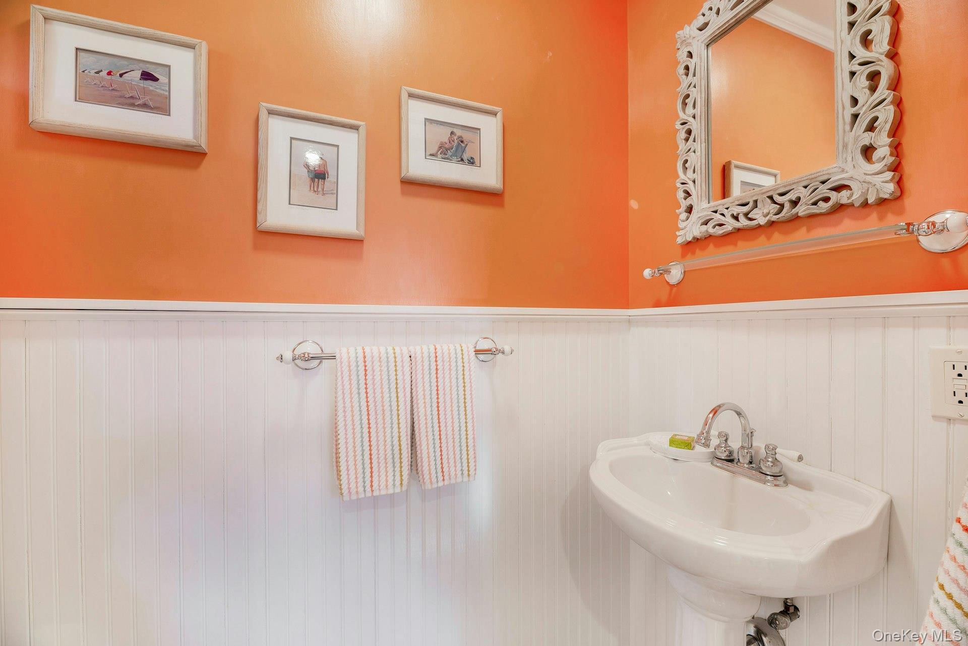 3600 Rocky Point Road East Marion, NY 11939 - Photo 19 of 45 a bathroom with a sink and a mirror