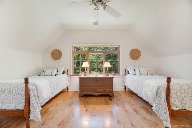 a bed room with a bed and a window