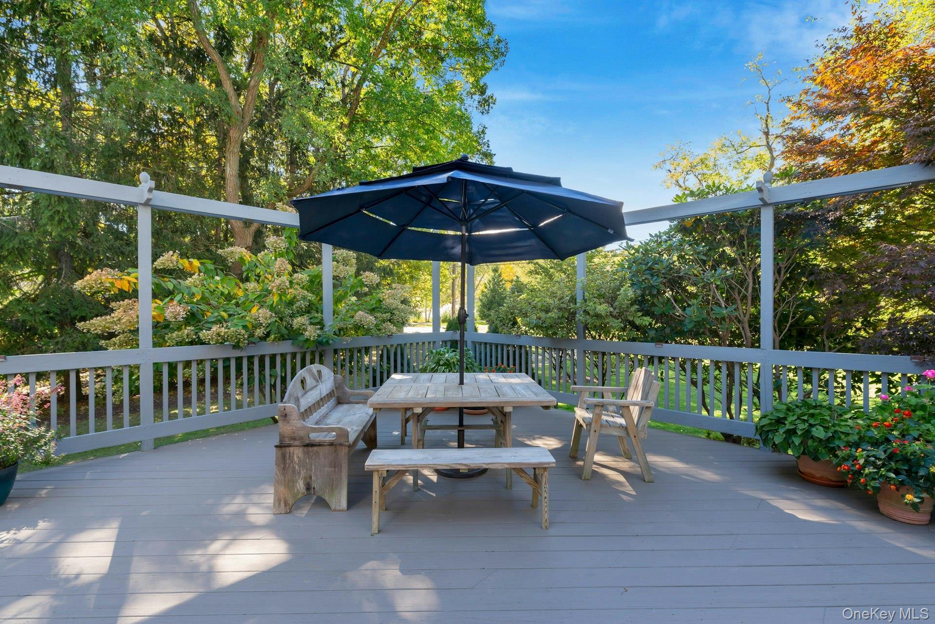 3600 Rocky Point Road East Marion, NY 11939 - Photo 30 of 45 a view of a chair and table on the wooden deck