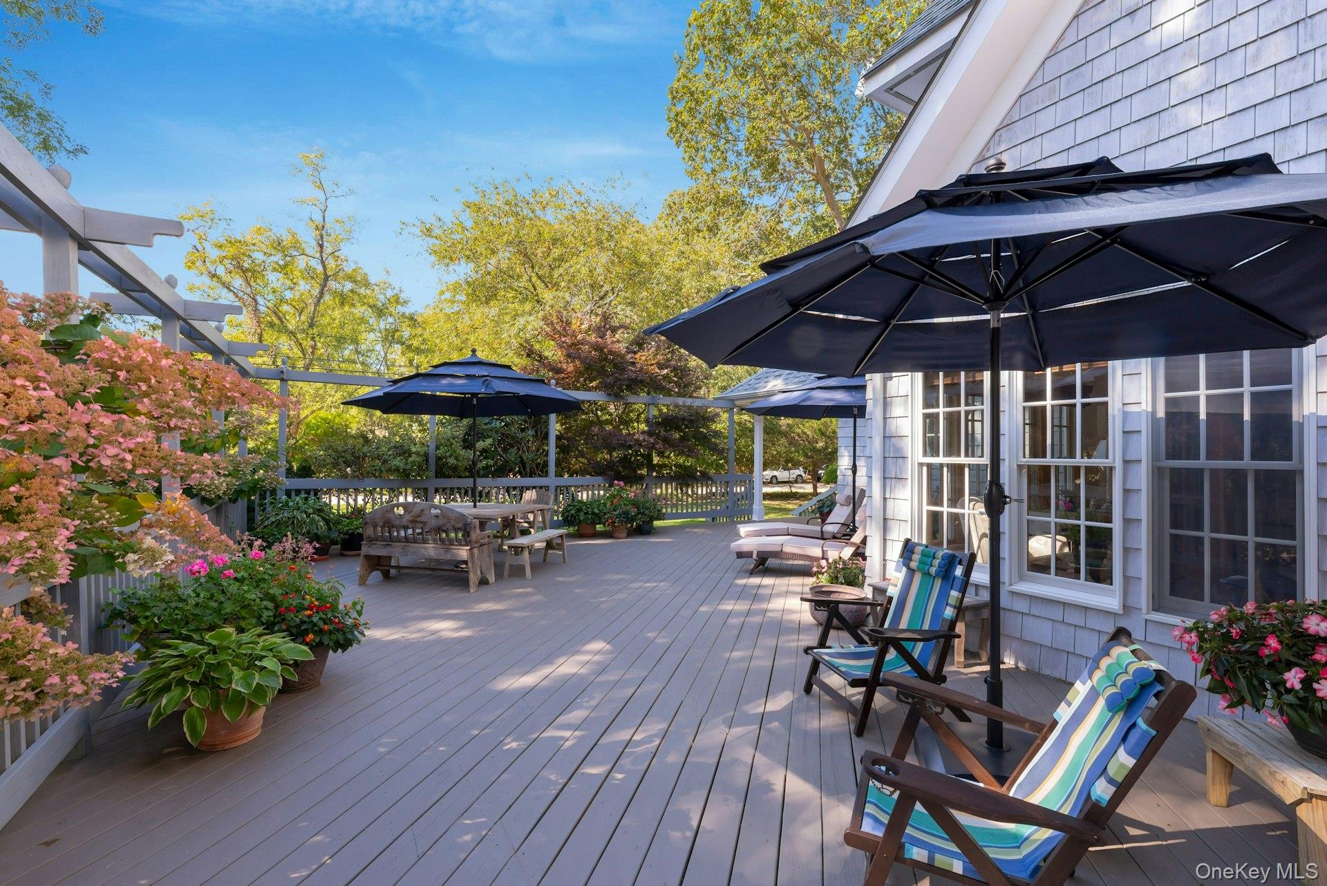 3600 Rocky Point Road East Marion, NY 11939 - Photo 32 of 44 a view of a backyard with sitting area and furniture