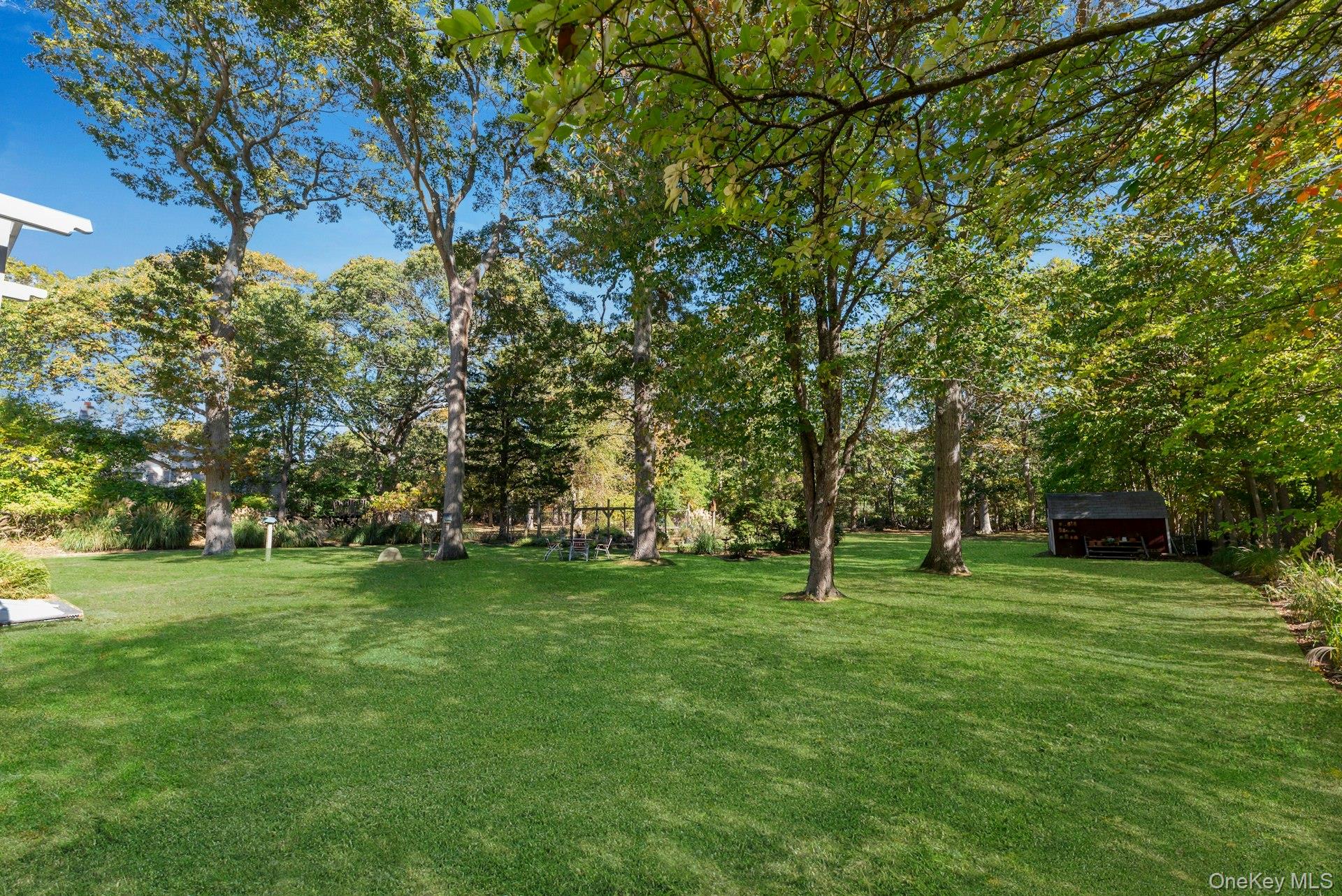 3600 Rocky Point Road East Marion, NY 11939 - Photo 34 of 45 a view of a park with large trees