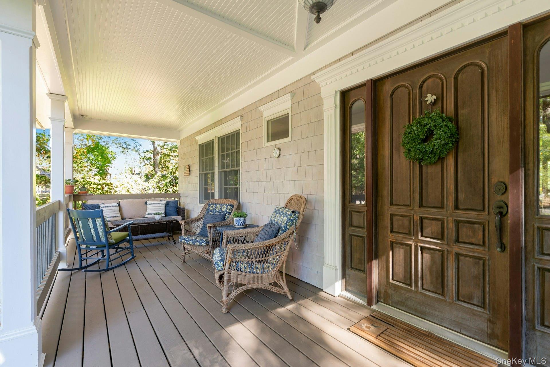3600 Rocky Point Road East Marion, NY 11939 - Photo 5 of 45 a balcony with furniture and wooden floor