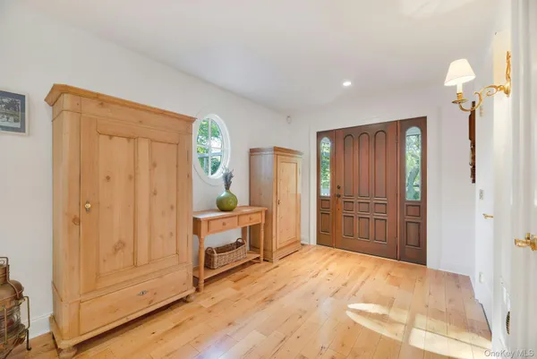 a view of a bedroom with closet and cabinet