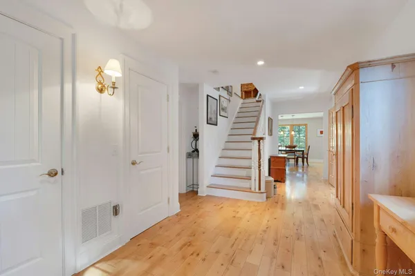 a view of entryway with wooden floor