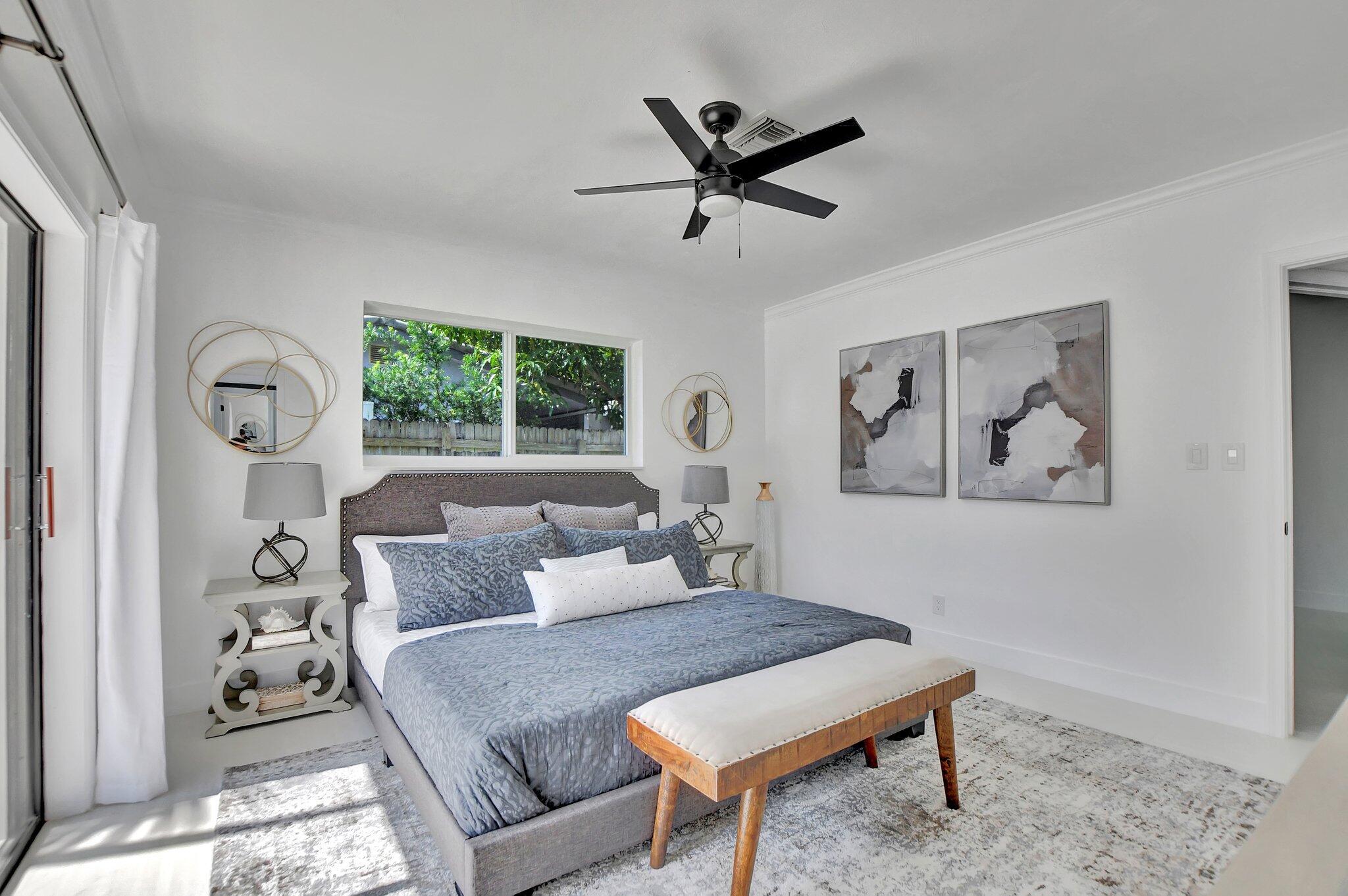 832 Southwest 10th Avenue Boca Raton, FL 33486 - Photo 21 of 57 a living room with furniture and a window