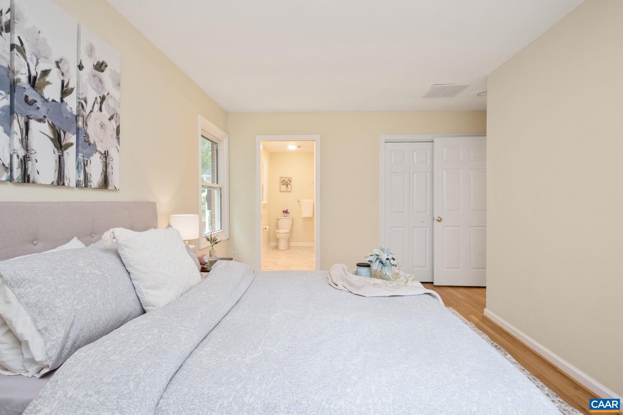 1680 Craigs Store Road Afton, VA 22920 - Photo 37 of 57 a bedroom with a bed and a couch