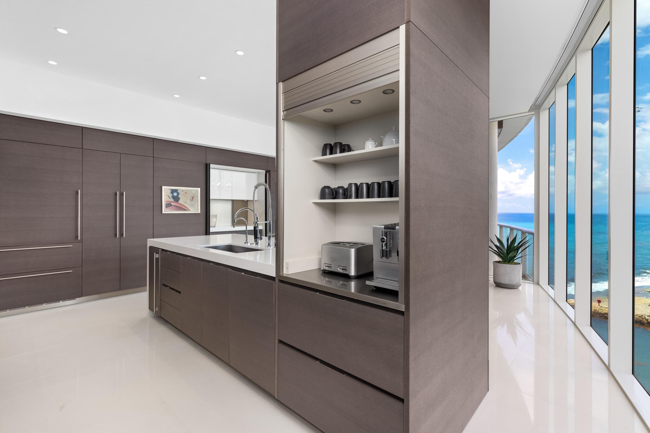 1000 South Ocean Boulevard, Unit 601 Boca Raton, FL 33432 - Photo 14 of 54 a room with cabinets