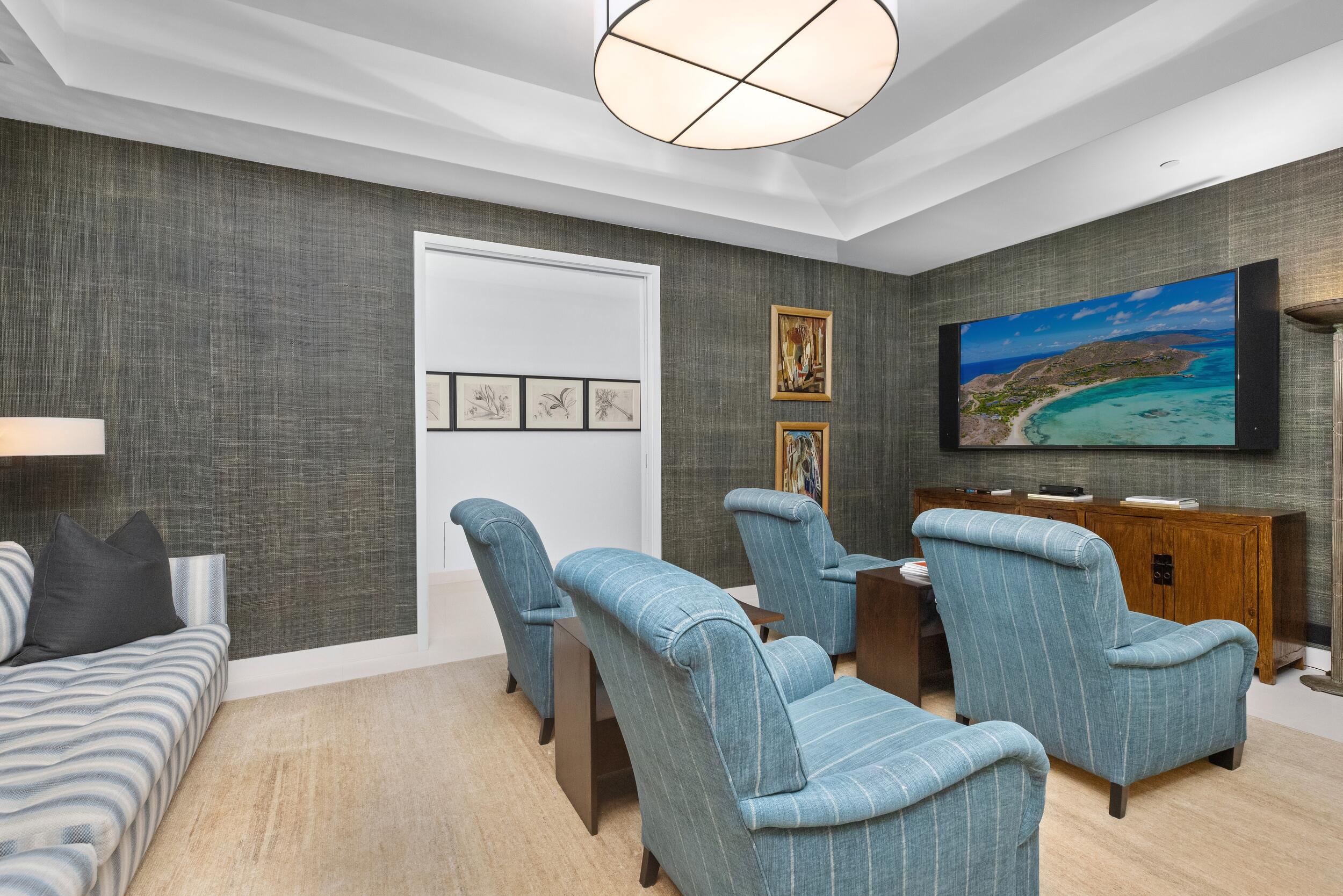 1000 South Ocean Boulevard, Unit 601 Boca Raton, FL 33432 - Photo 18 of 54 a living room with furniture and a flat screen tv