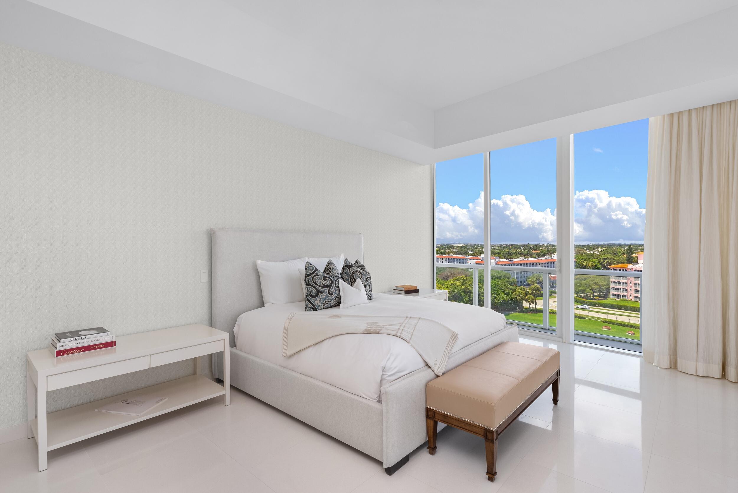1000 South Ocean Boulevard, Unit 601 Boca Raton, FL 33432 - Photo 19 of 54 a bedroom with a bed and a large window