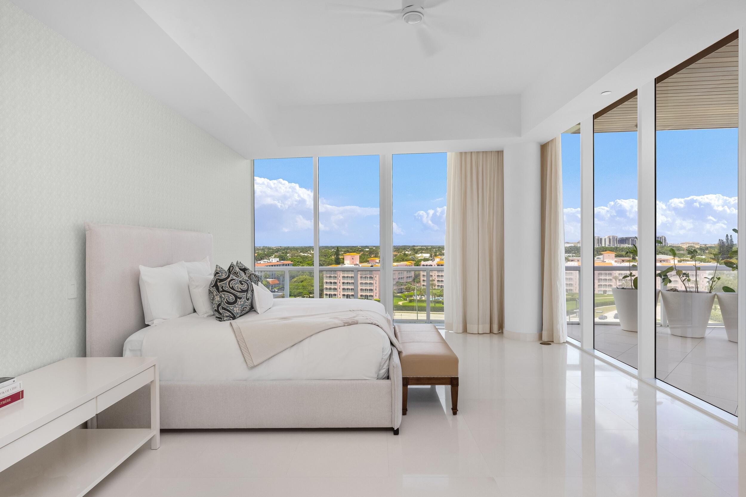 1000 South Ocean Boulevard, Unit 601 Boca Raton, FL 33432 - Photo 26 of 54 a living room with furniture and a floor to ceiling window