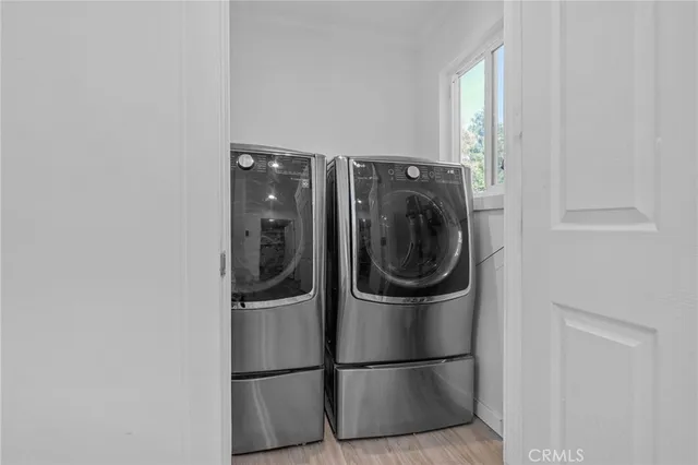 a bathroom with a toilet a sink and bathtub