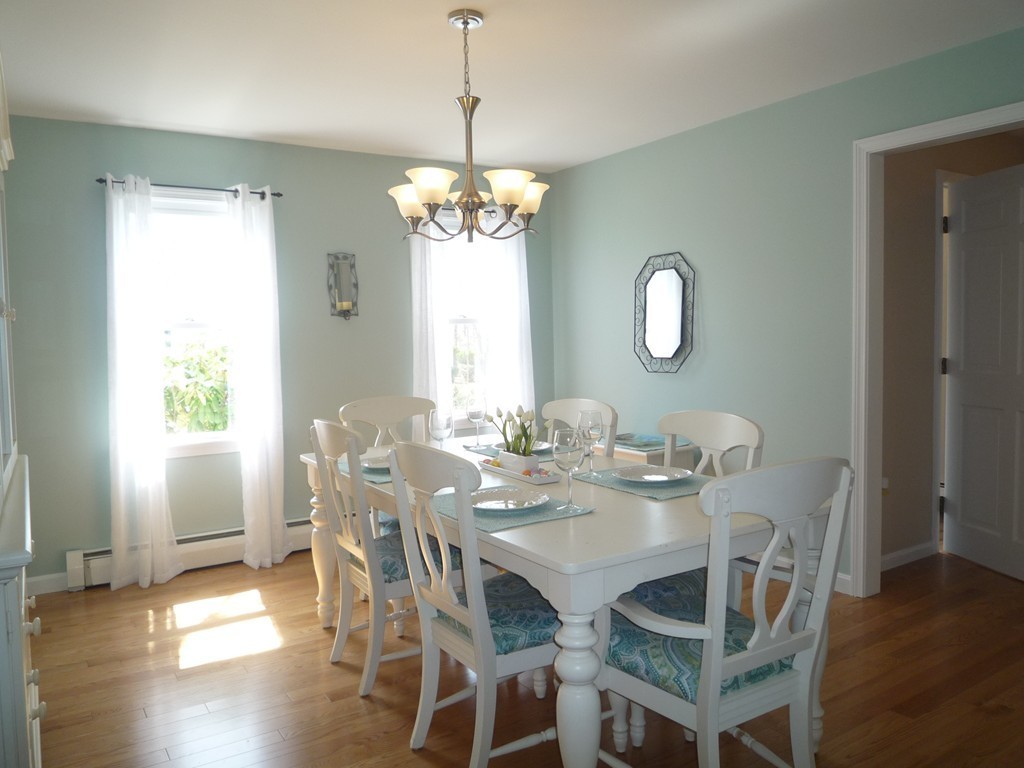 100 Highcrest Road Fall River, MA 02720 - Photo 16 of 30 a view of a dining room with furniture wooden floor and chandelier