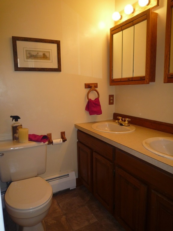 100 Highcrest Road Fall River, MA 02720 - Photo 22 of 30 a bathroom with a toilet sink and mirror