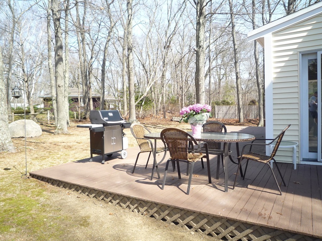 100 Highcrest Road Fall River, MA 02720 - Photo 29 of 30 a view of a dinning table and chairs in the patio