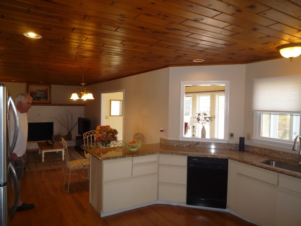 100 Highcrest Road Fall River, MA 02720 - Photo 7 of 30 a kitchen with sink stove and cabinets