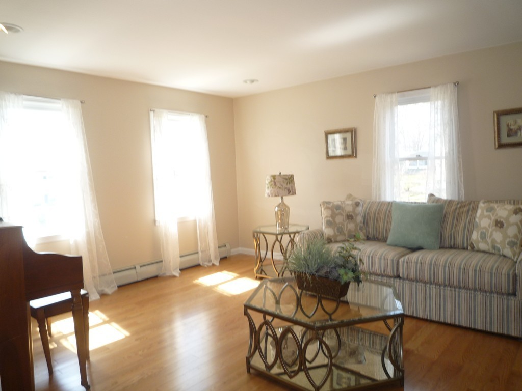 100 Highcrest Road Fall River, MA 02720 - Photo 8 of 30 a living room with furniture and a window