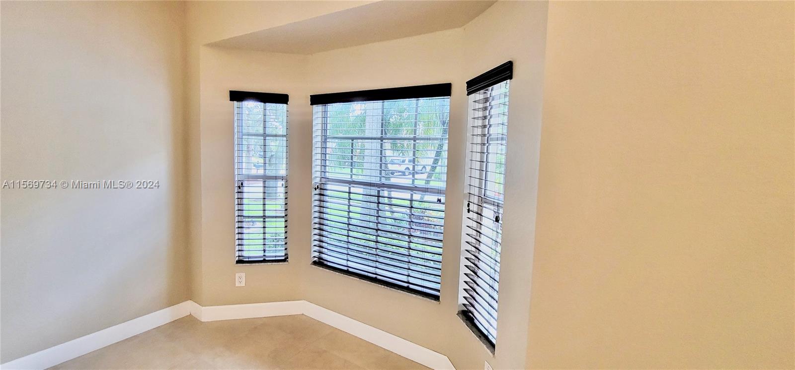 16519 Ruby Lake, Unit 16519 Weston, FL 33331 - Photo 14 of 24 a view of an empty room with a window