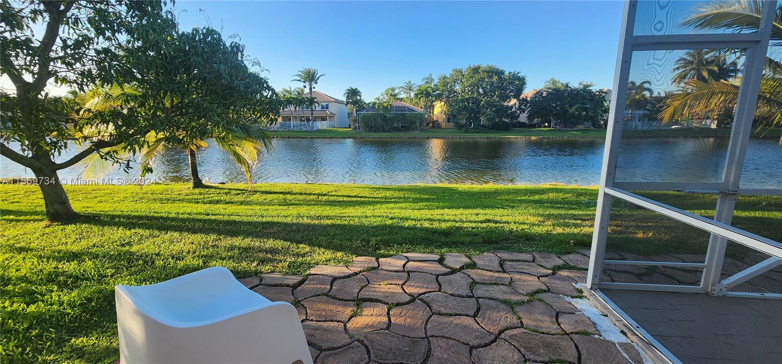 16519 Ruby Lake, Unit 16519 Weston, FL 33331 - Photo 20 of 24 a view of a backyard of a house