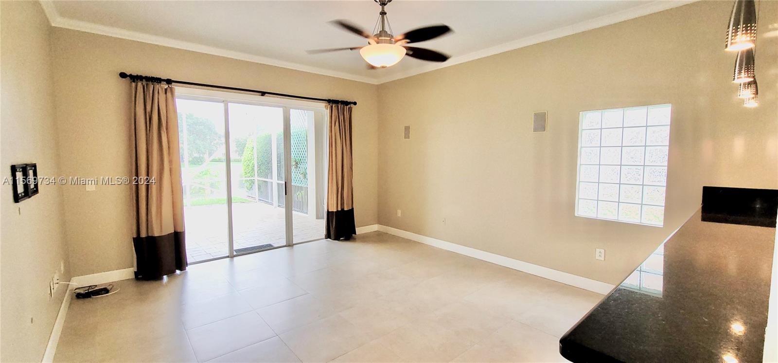 16519 Ruby Lake, Unit 16519 Weston, FL 33331 - Photo 4 of 24 wooden floor in an empty room with a window