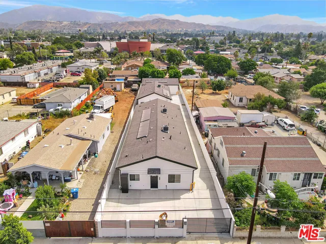 a view of a house with basketball court