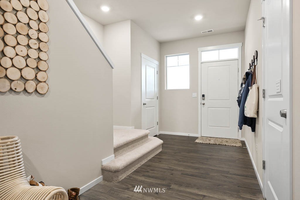 32 211th Street Southeast, Unit P19 Bothell, WA 98021 - Photo 4 of 31 a view of entryway with wooden floor