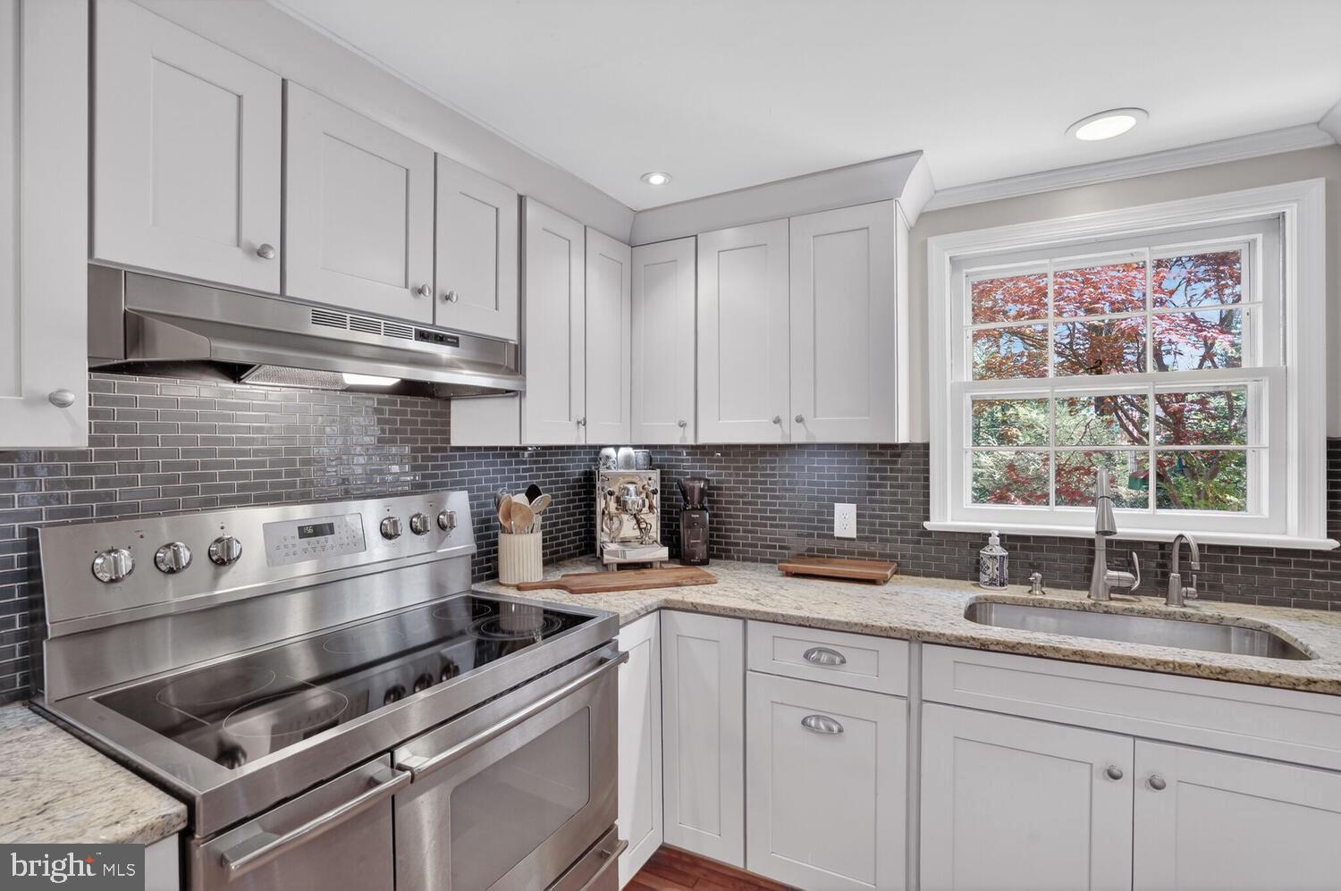 3811 Bent Branch Road Falls Church, VA 22041 - Photo 12 of 65 Kitchen - glass tile backsplash