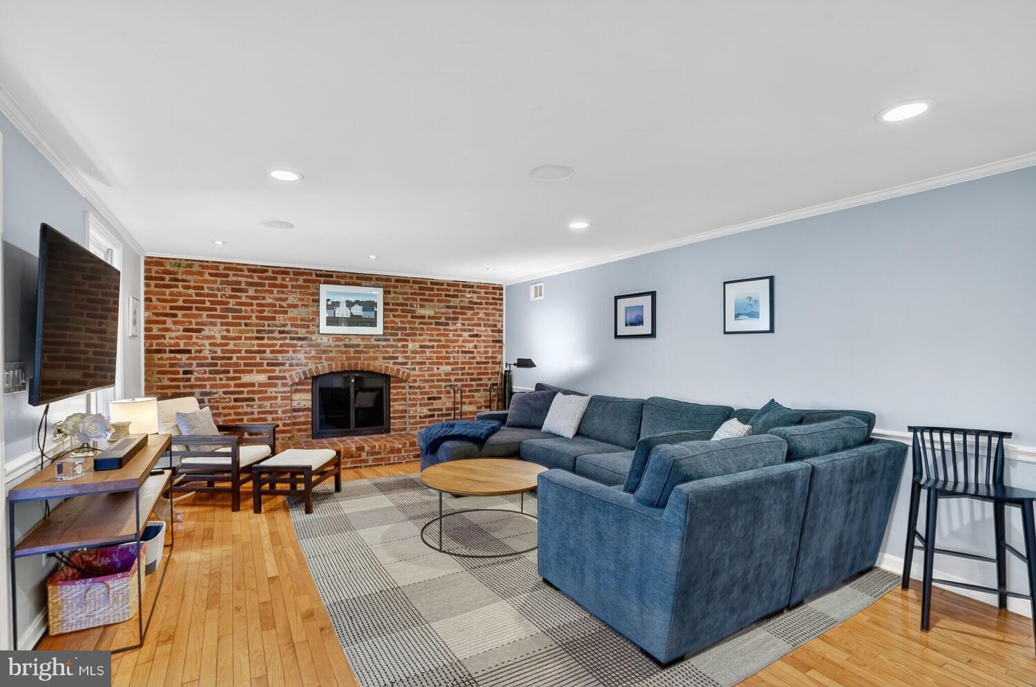3811 Bent Branch Road Falls Church, VA 22041 - Photo 15 of 65 Family room - wood floors, wood burning fireplace