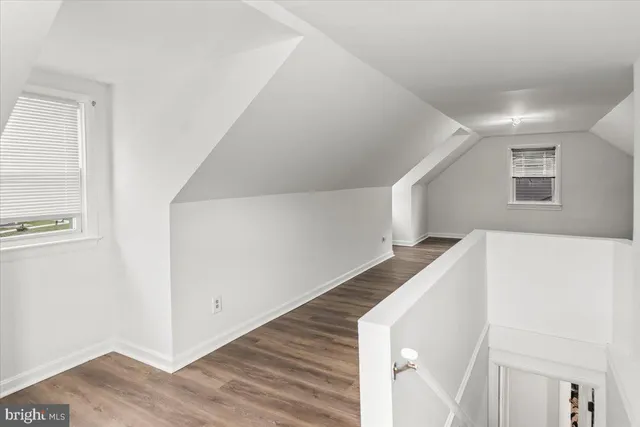 a view of front door and wooden floor