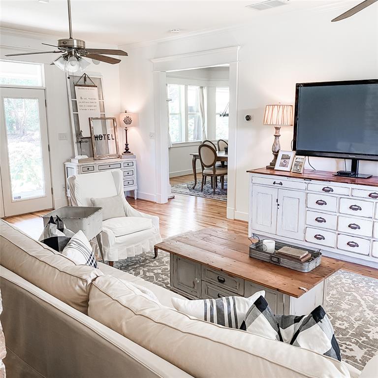 581 Country Club Road Fairview, TX 75069 - Photo 18 of 39 a living room with furniture and a flat screen tv