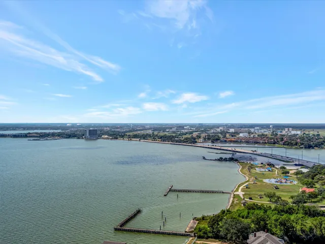 a view of a lake with a city