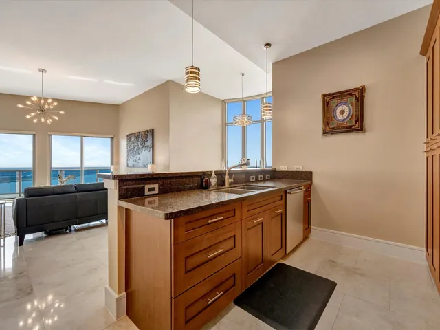 a kitchen with a stove and a sink