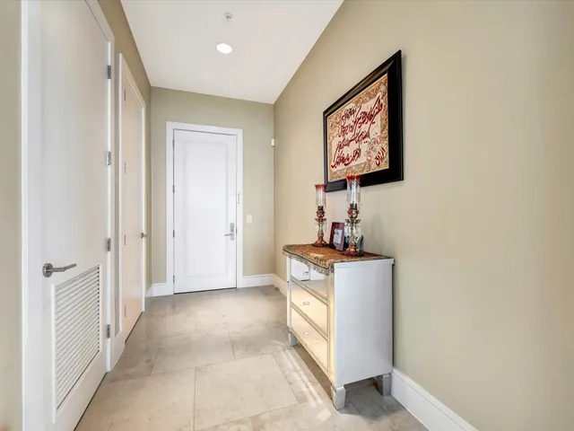 a view of a storage & utility room with a window