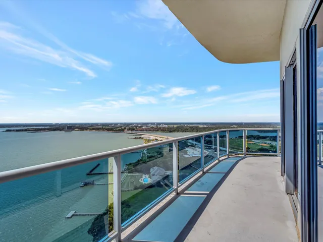 a view of a balcony with lake view