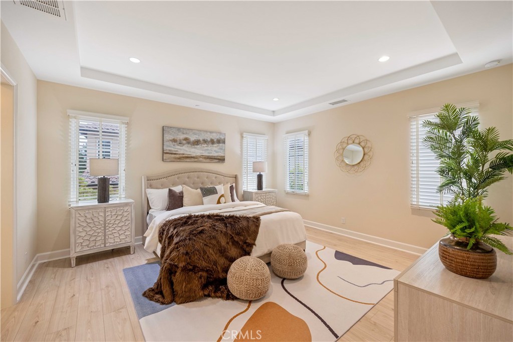 73 Copper Mine Irvine, CA 92602 - Photo 15 of 35 a bed room with a bed and a window