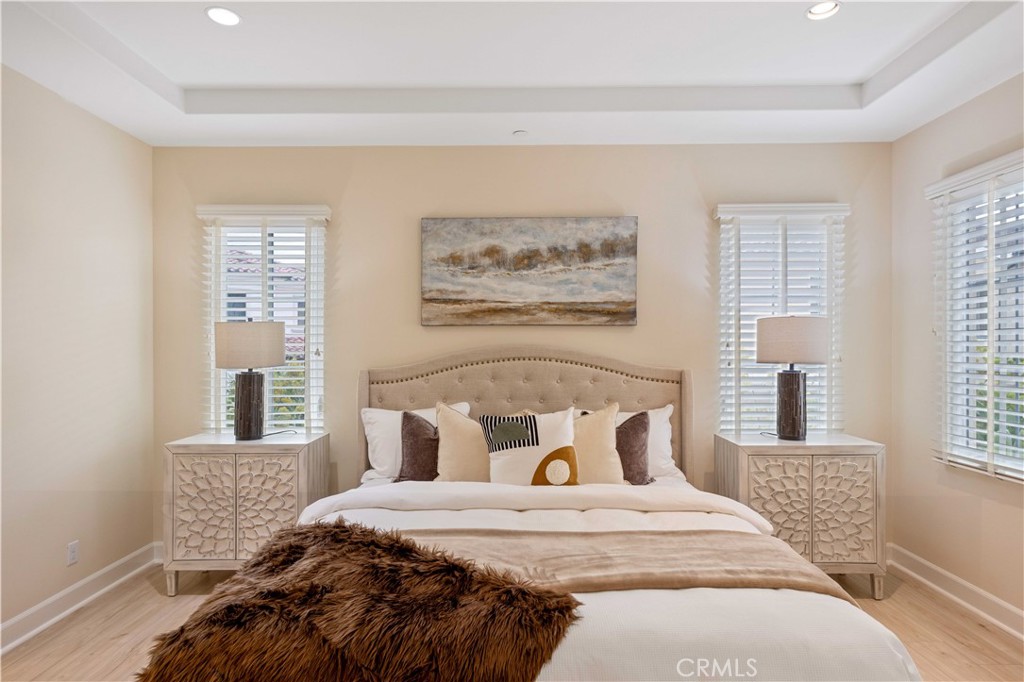 73 Copper Mine Irvine, CA 92602 - Photo 16 of 35 a bed sitting in a bedroom next to a window