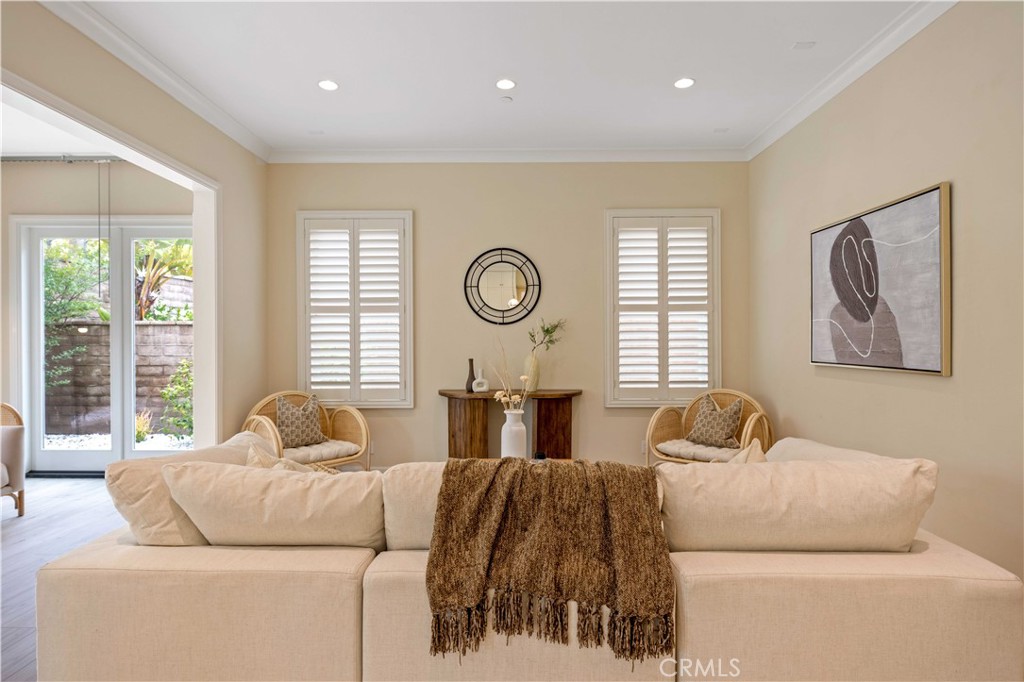 73 Copper Mine Irvine, CA 92602 - Photo 3 of 35 a living room with furniture and a large window