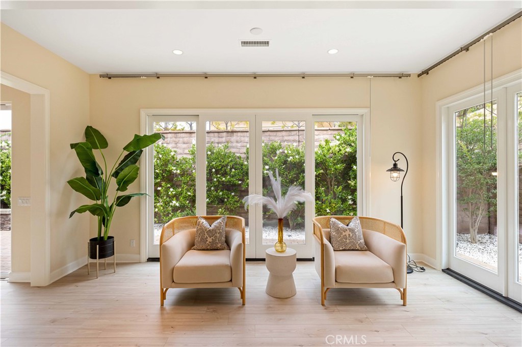 73 Copper Mine Irvine, CA 92602 - Photo 5 of 35 a living room with furniture and a large window