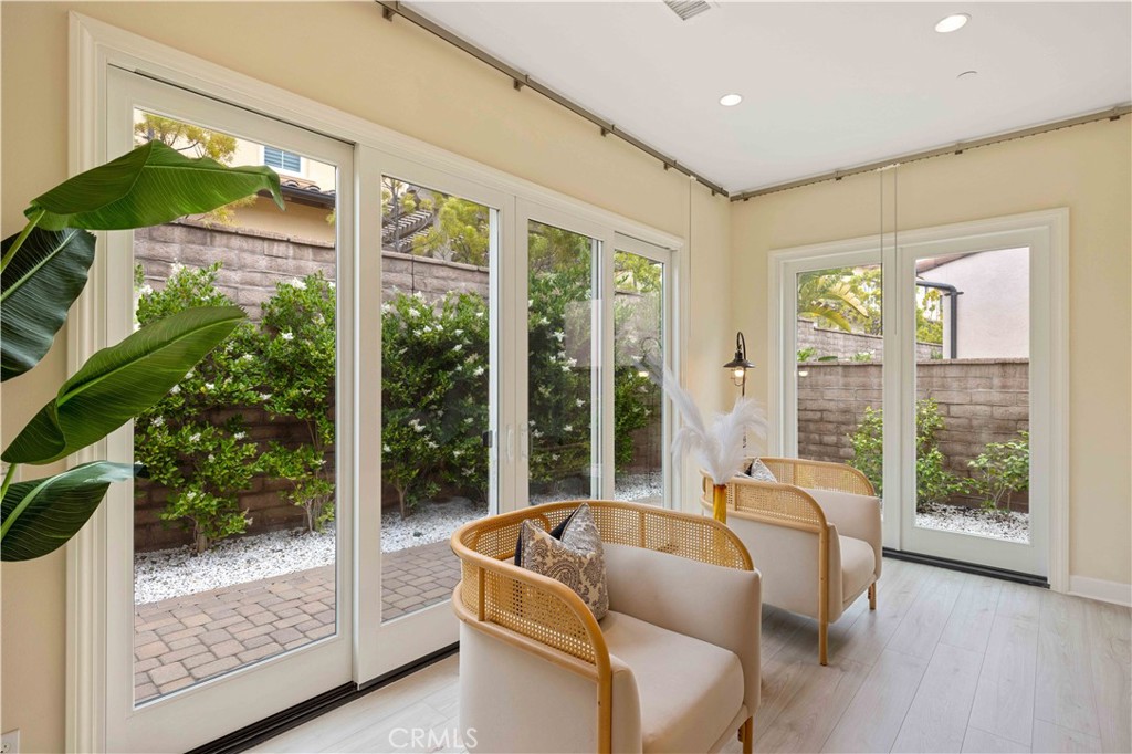 73 Copper Mine Irvine, CA 92602 - Photo 6 of 35 a living room with couch and windows