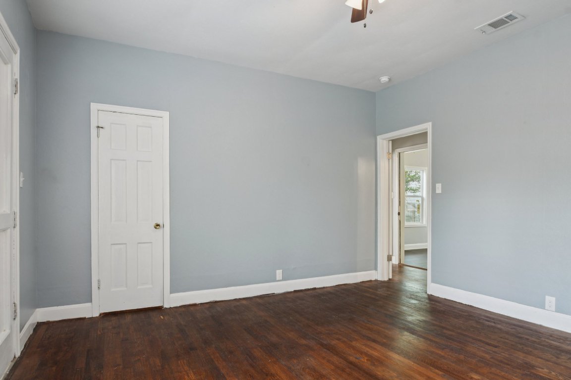 308 Taylor Road Elgin, TX 78621 - Photo 22 of 29 Spare room featuring dark wood-style floors and ceiling fan