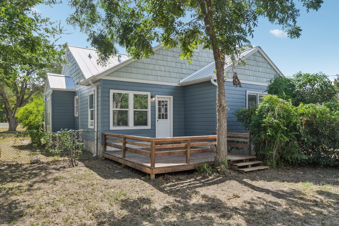 308 Taylor Road Elgin, TX 78621 - Photo 26 of 29 Rear view of property with a deck and a metal roof